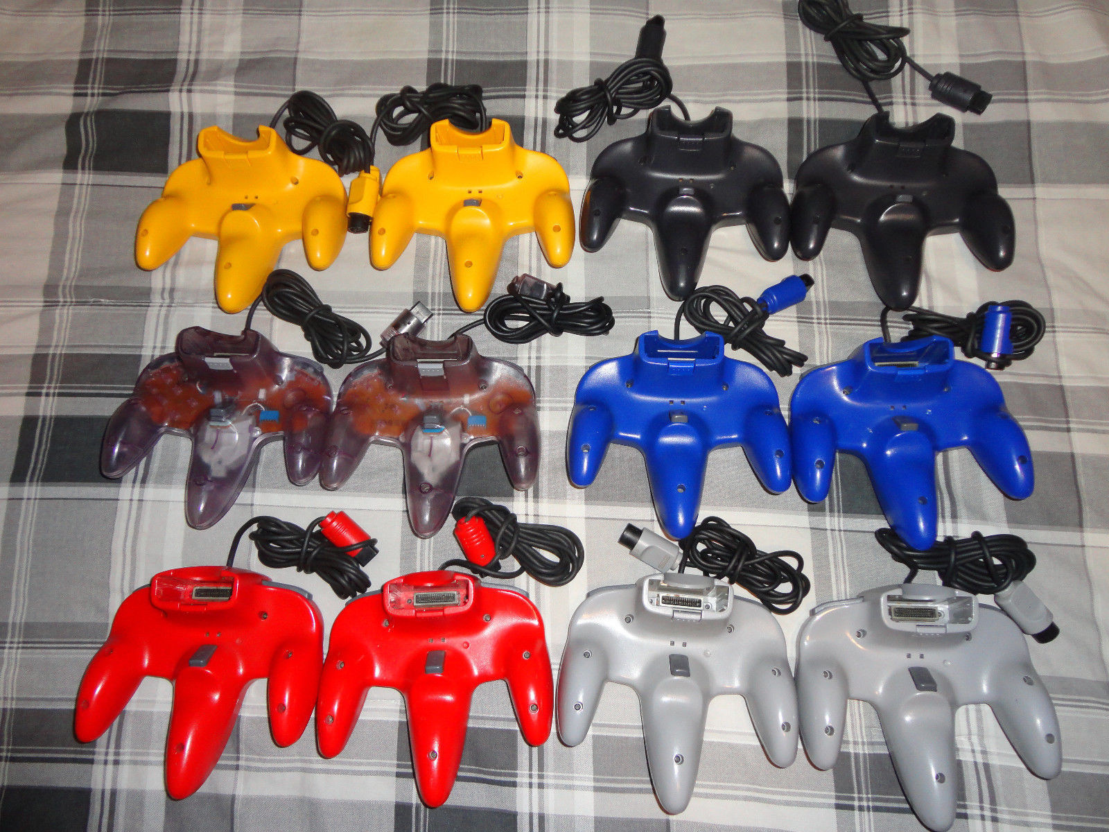 (2) N64 NINTENDO 64 controller ,yellow, red, gray, black, purple, blue, ORIGINAL