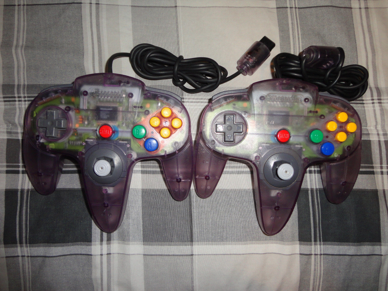(2) N64 NINTENDO 64 controller ,yellow, red, gray, black, purple, blue, ORIGINAL