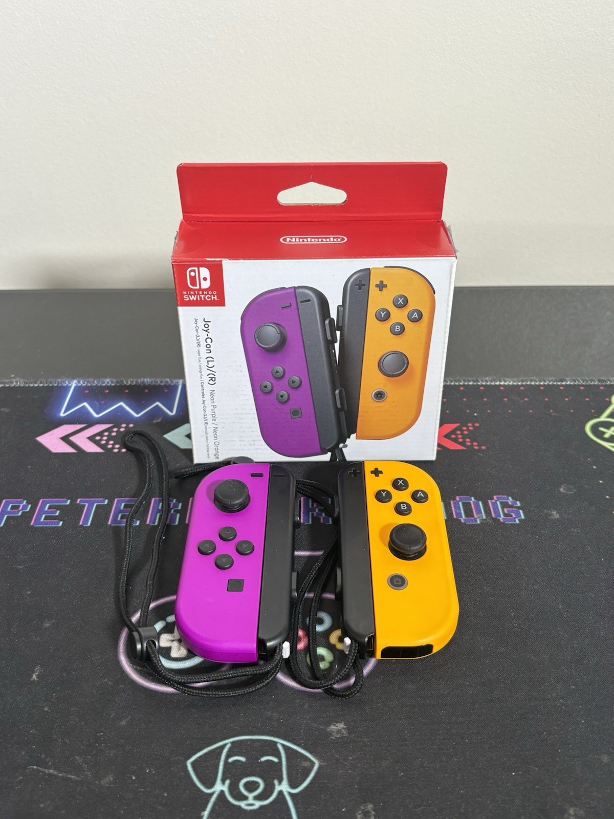 Nintendo Switch Joy-Con L/R – Neon Purple/Neon Orange – Excellent Condition.