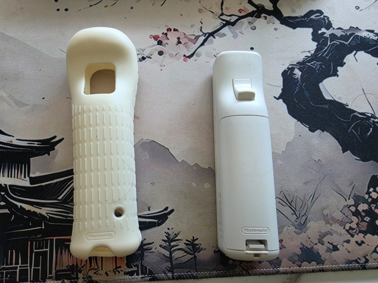 Nintendo Wii Remote Plus – White with White Sleeve