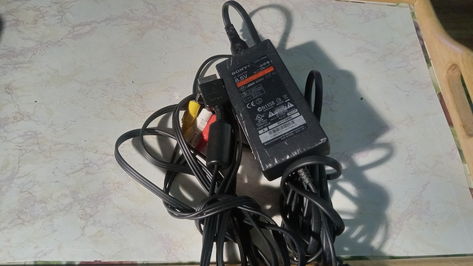Tested and working Sony power cord SCPH -79100 and Sony AV cable working in the