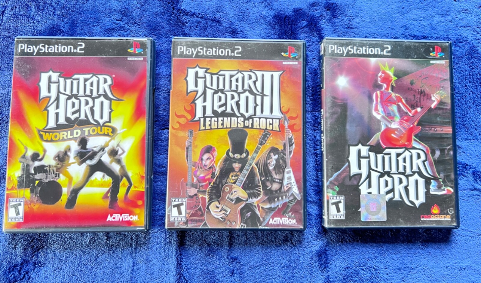 New PlayStation 2 Red Octane Wireless Guitar Hero II and Game with 3 Used Games