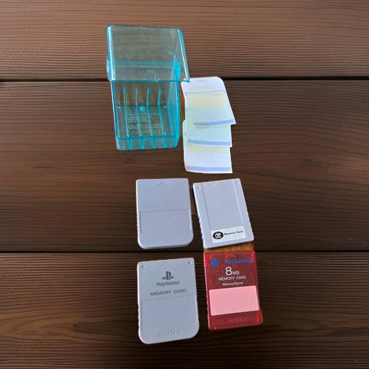 Playstation Memory Cards and Case • 4 Memory Cards • Case • 3 Label Stickers