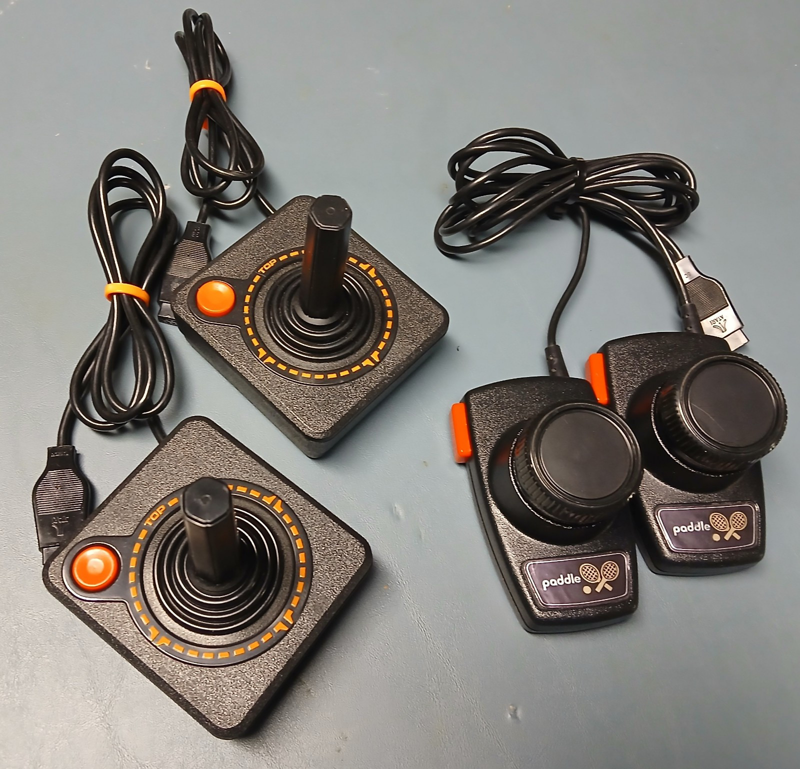 Atari 2600 Controller Package – 2 CX-40 Joysticks And A Pair Of CX-30 Paddles