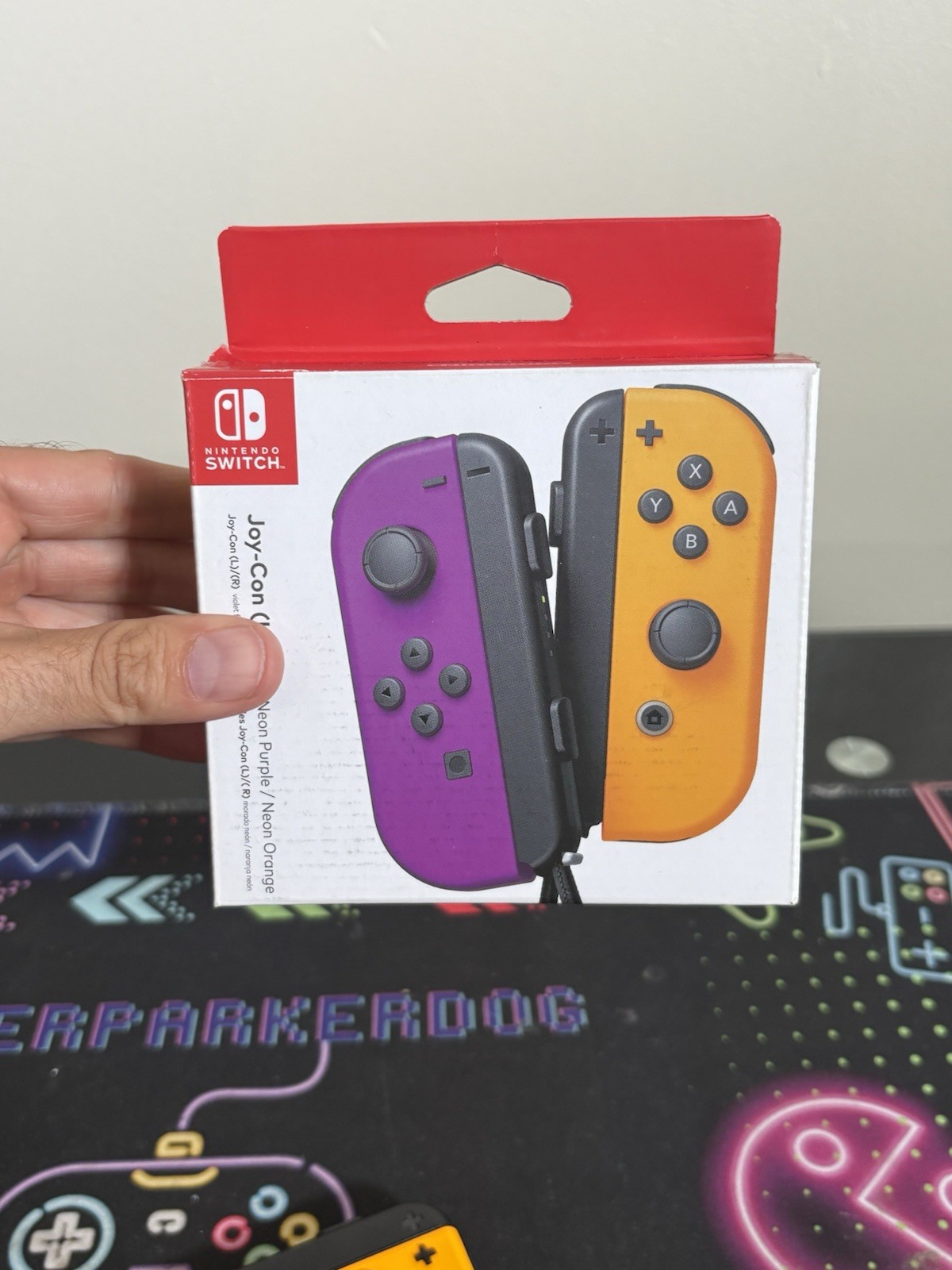 Nintendo Switch Joy-Con L/R – Neon Purple/Neon Orange – Excellent Condition.