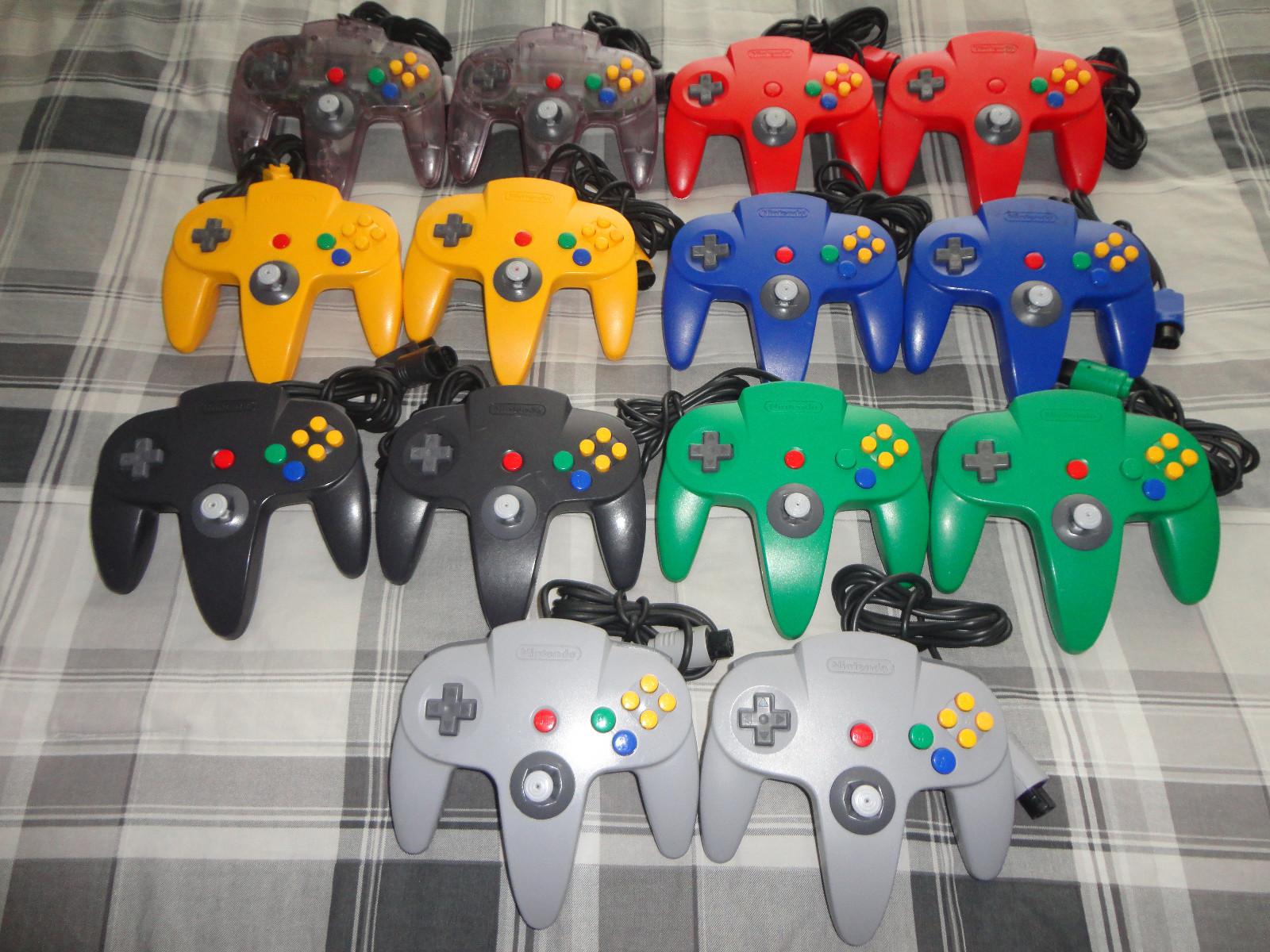 (2) N64 NINTENDO 64 controller ,yellow, red, gray, black, purple, blue, ORIGINAL