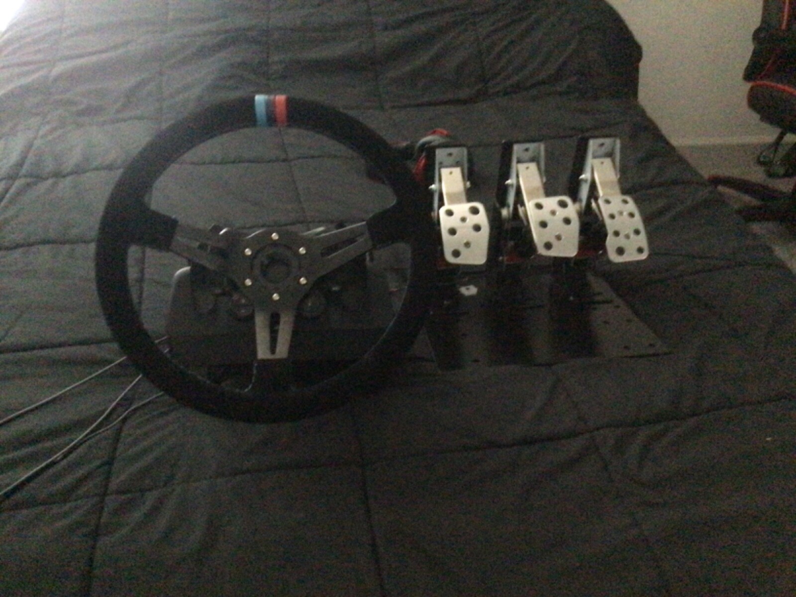 Logitech g923 PS5/PS4. Custom steering wheel on. Deep dish, with custom pedals.