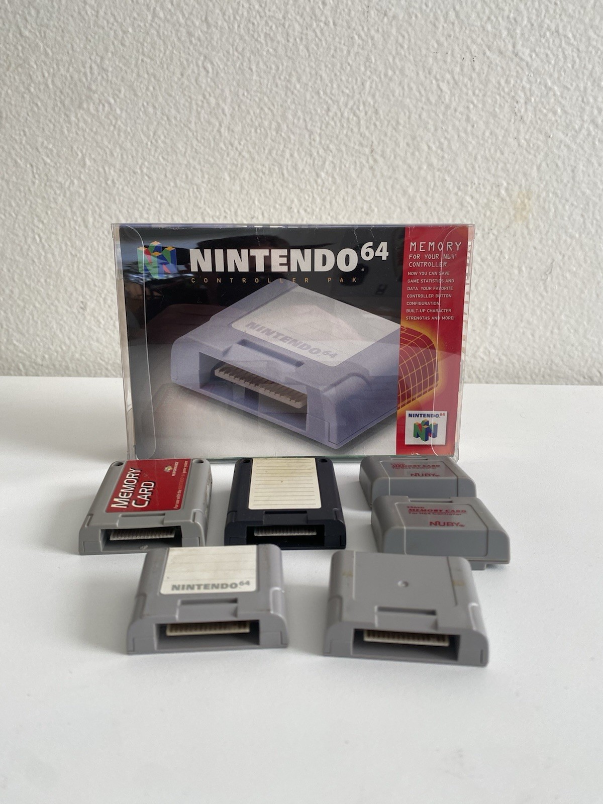 Nintendo 64 Controller Paks – Lot of 6 – with Box – *NOT TESTED* – *BOX CREASED*