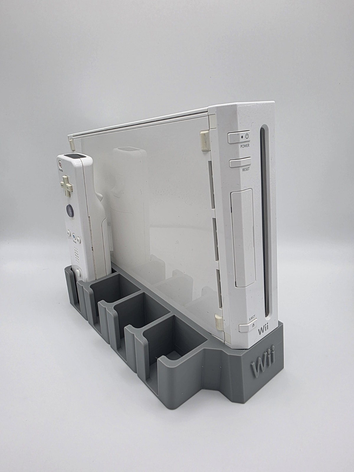 Nintendo Wii stand with slots for 4 remotes (No rubber sleeve) gray