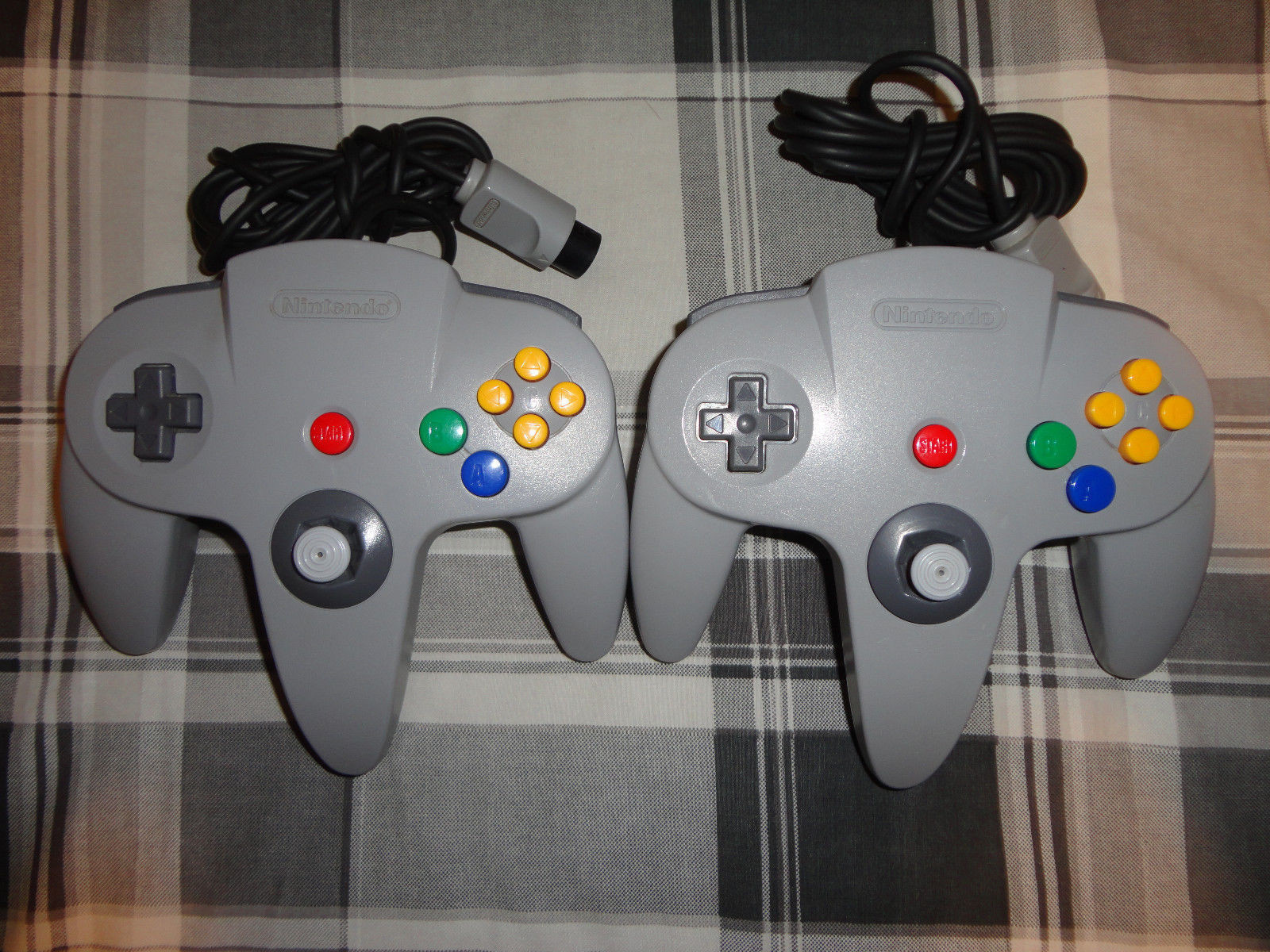 (2) N64 NINTENDO 64 controller ,yellow, red, gray, black, purple, blue, ORIGINAL