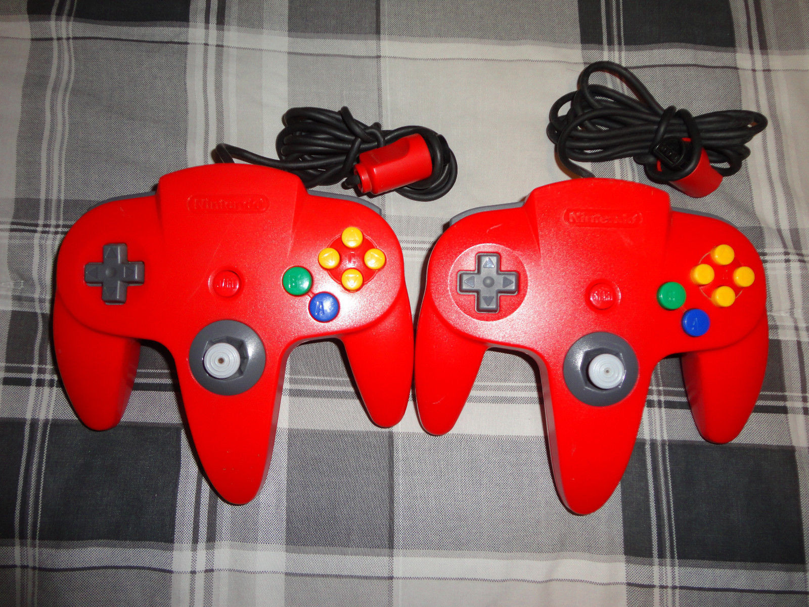 (2) N64 NINTENDO 64 controller ,yellow, red, gray, black, purple, blue, ORIGINAL