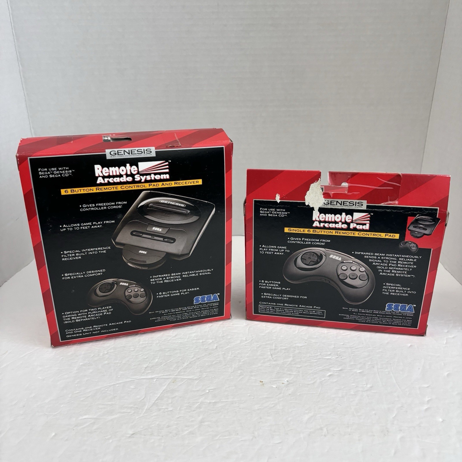 2 Sega Genesis Remote Arcade Pad and 6 Button Remote Control Pad – BOX ONLY Lot
