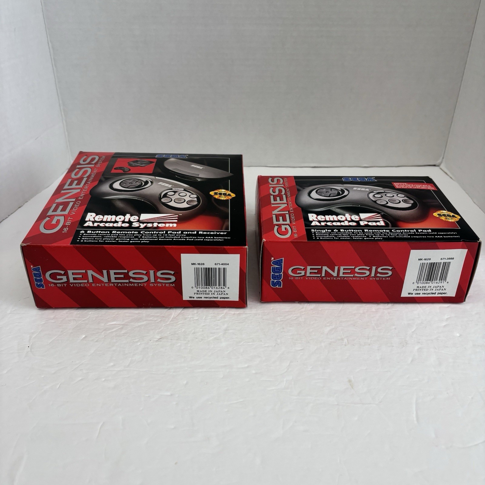 2 Sega Genesis Remote Arcade Pad and 6 Button Remote Control Pad – BOX ONLY Lot