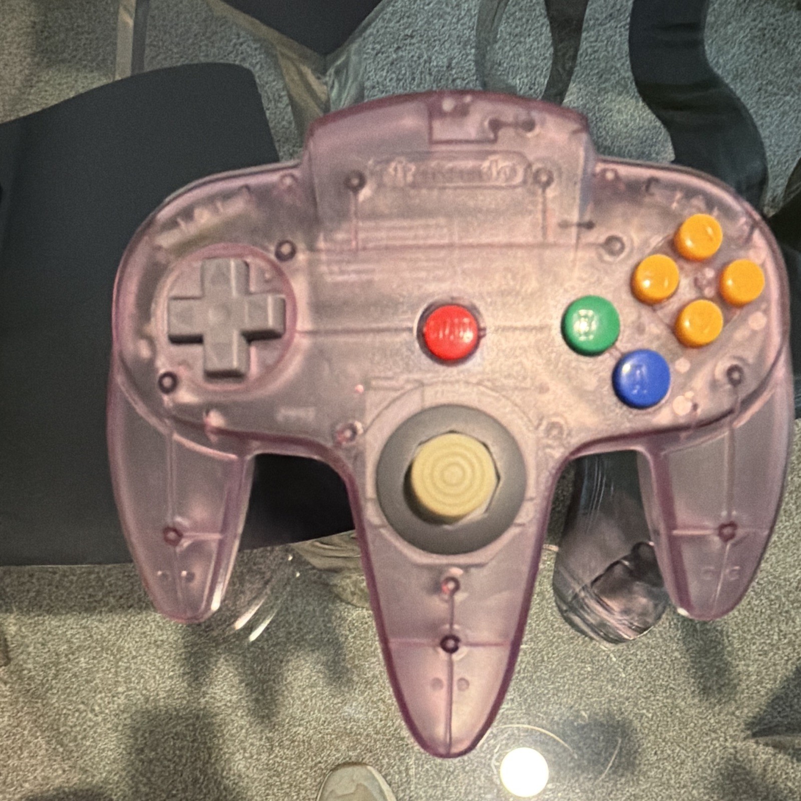 8-bit wireless conversion for Nintendo 64 controller installed and clear purple