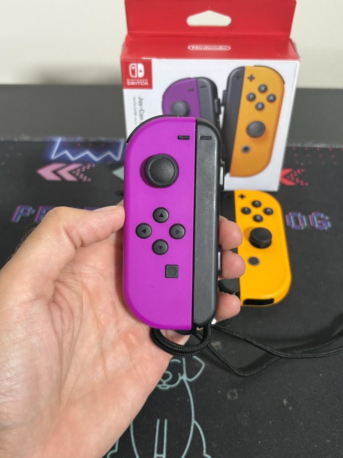 Nintendo Switch Joy-Con L/R – Neon Purple/Neon Orange – Excellent Condition.