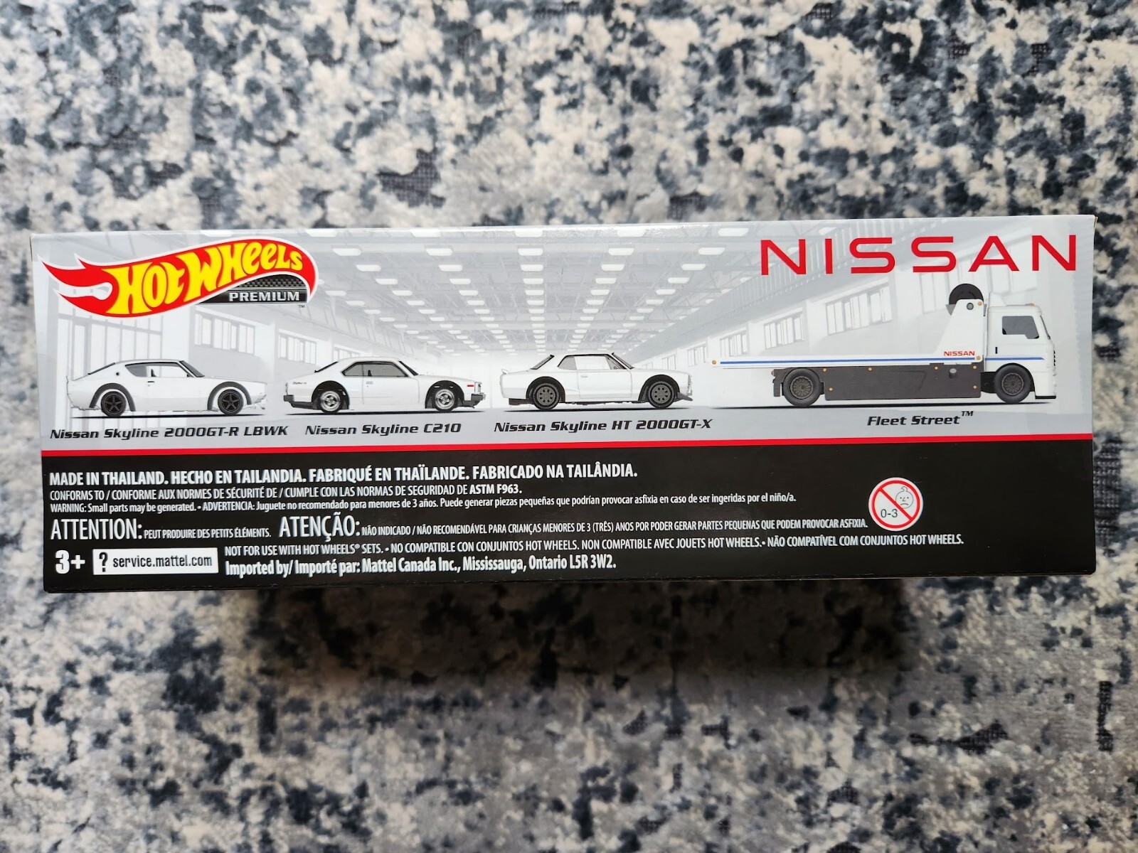 Hot Wheels Premium Collector Set, 3 Nissan Skyline Cars & 1 Transporter
