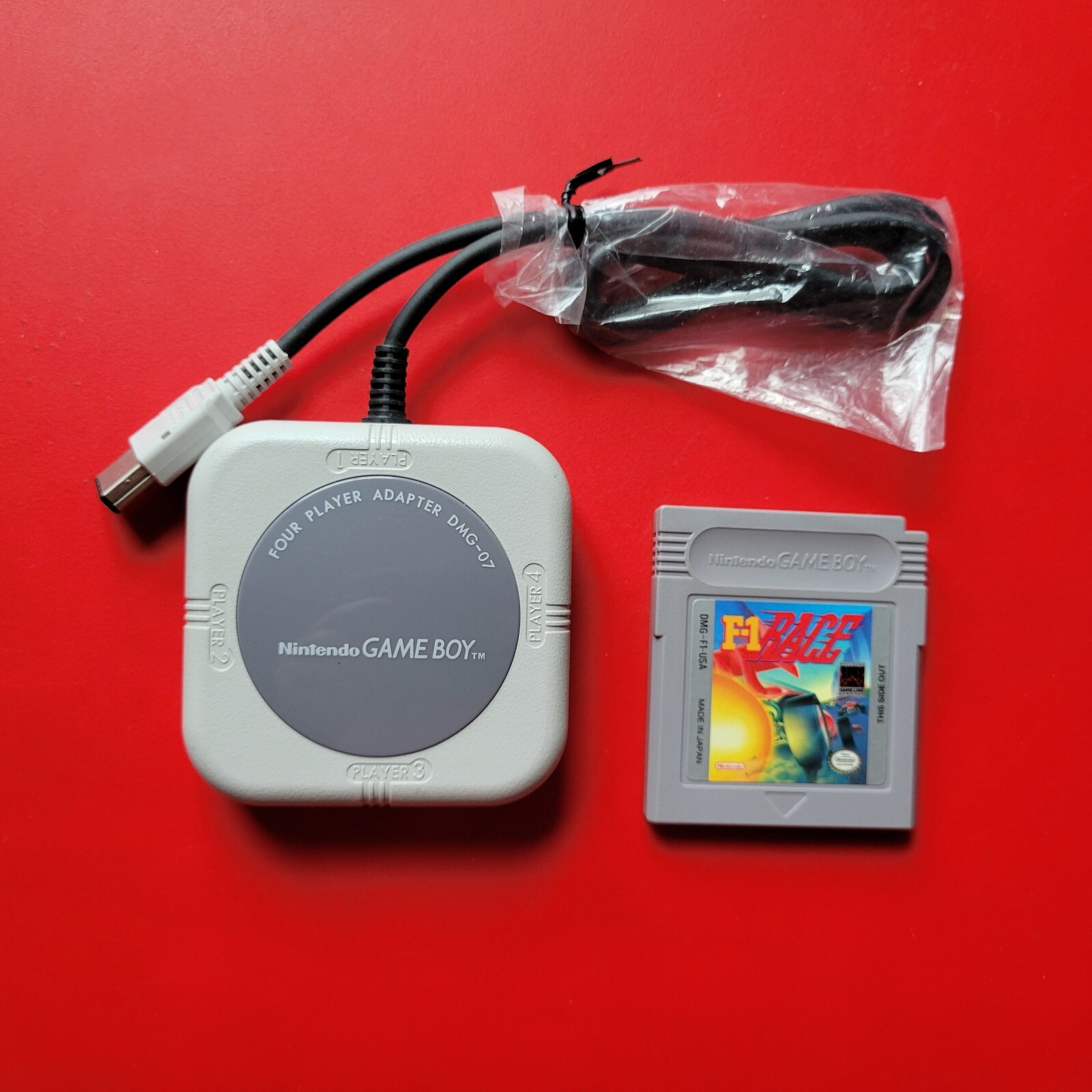 Four Player Adapter Game Boy Original OEM Nintendo DMG-07 with F-1 Race Game