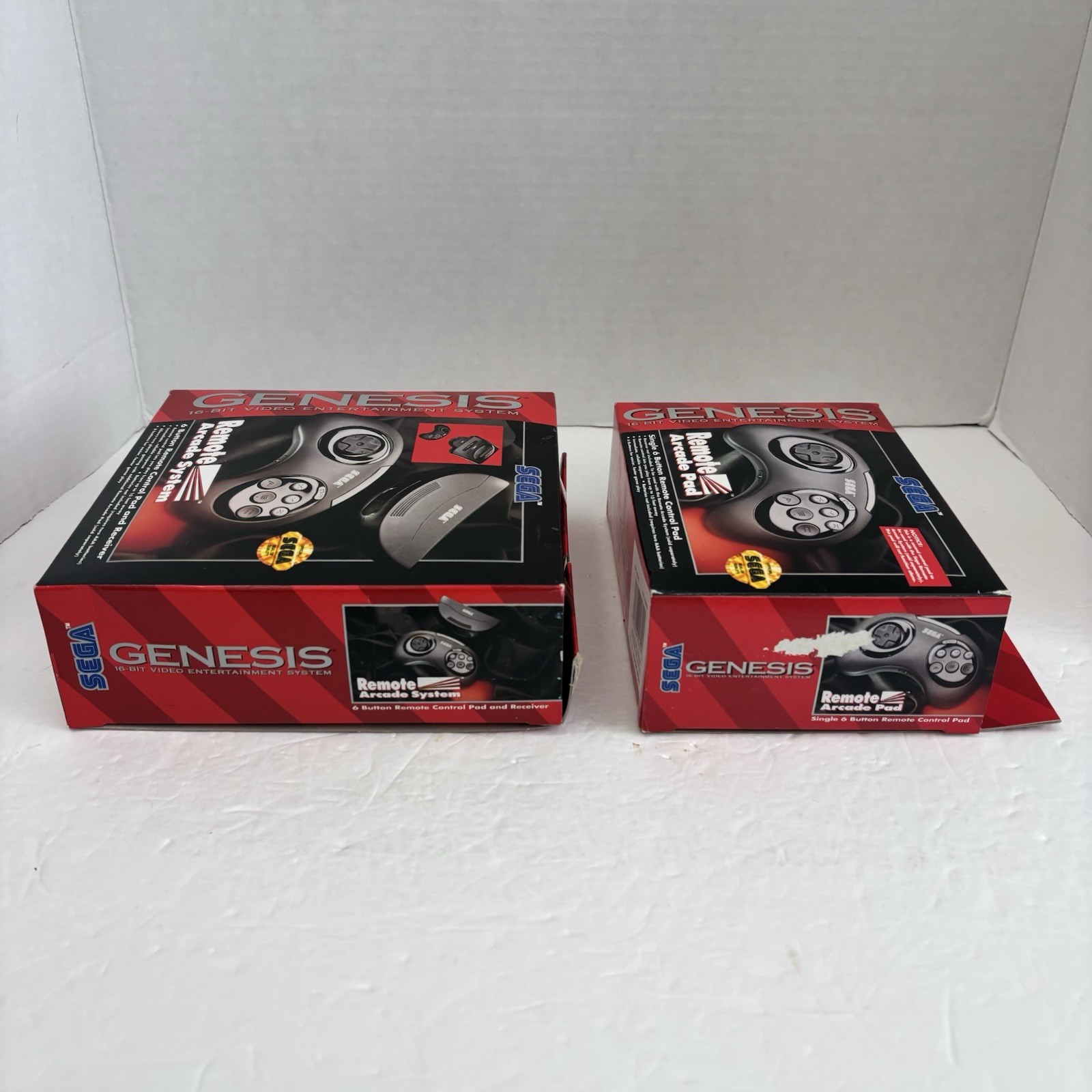2 Sega Genesis Remote Arcade Pad and 6 Button Remote Control Pad – BOX ONLY Lot