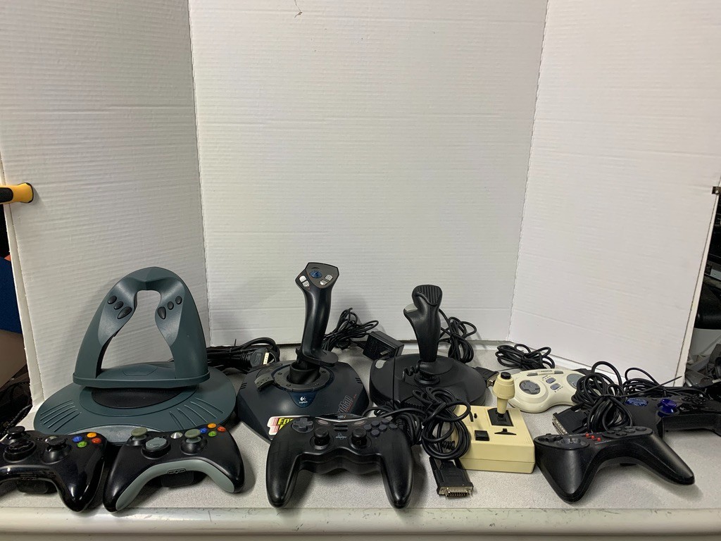 ** Mixed lot of Vintage Gamepad Controllers & Sticks – AS-IS – UNTESTED